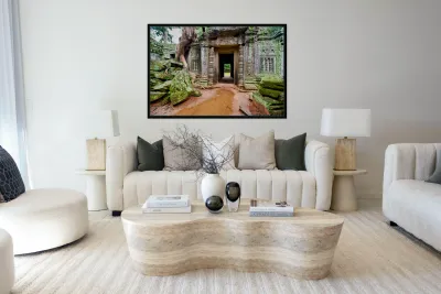 Ancient temple ruins overgrown by trees and moss. Reproduction