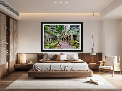 Massive tree roots engulf ancient temple ruins with moss. Reproduction