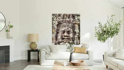 Ancient Khmer stone face Bayon temple. Reproduction