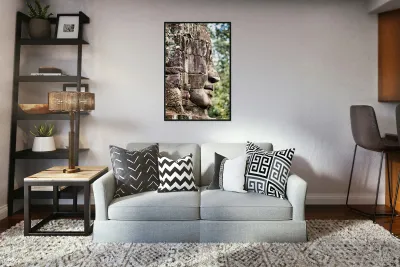 Weathered stone face carving from an ancient temple. Reproduction