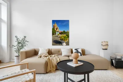 Golden temple green trees and birds under a blue sky. Reproduction