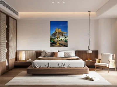 Majestic Cambodian temple under a blue sky with flying birds. Reproduction