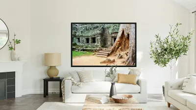 Ancient temple ruins intertwined with giant tree. Reproduction