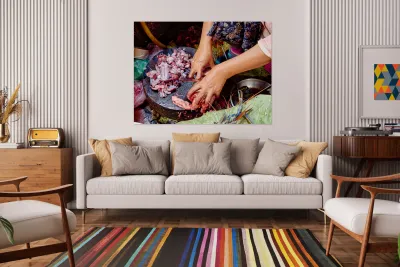 Hands preparing raw frog meat and seafood. Reproduction