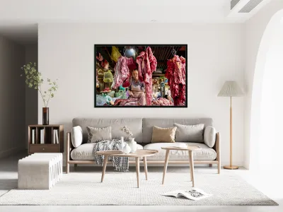 Woman selling raw meat in a bustling market. Reproduction