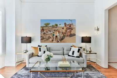 Children playing near their home in Himba Village in Namibia Reproduction