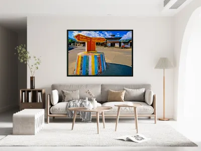 Colorful Bhutanese signpost directs to Thimphu and Trashigang. Reproduction