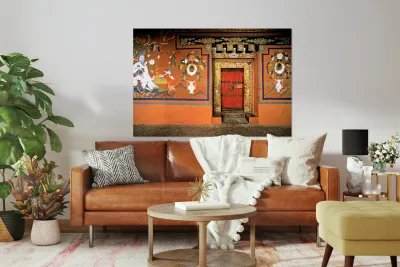 Vibrant wall murals and an ornate red door. Reproduction