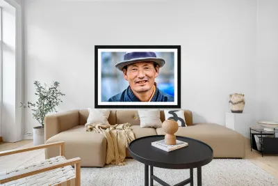 Portrait of a smiling man wearing a hat. Reproduction