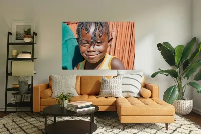 Joyful child smiles in Kavango Region of Namibia Reproduction