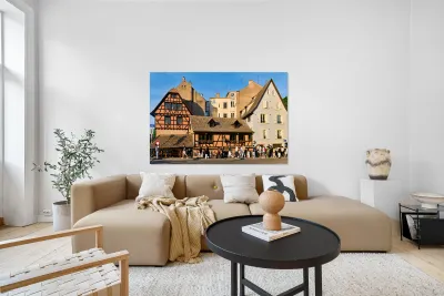 Historic houses and people walking in Petit France Strasbourg Reproduction