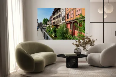 Timber houses by the canal in Strasbourgs Petit France district Reproduction