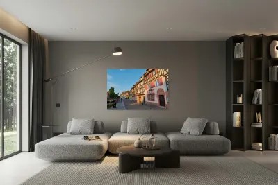 People walking along the canal in Petite Venise Colmar during ev Reproduction