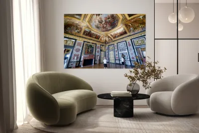 Two people explore the decorated room at the Palace of Versaille Reproduction
