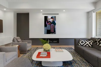 Masked individuals in traditional clothing hold hands in Tibet Reproduction