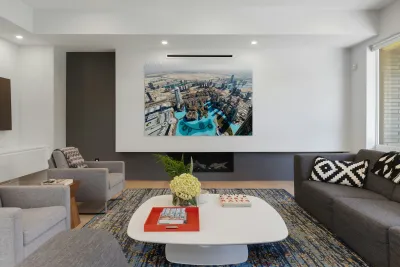 Skyline view of Dubai with skyscrapers and artificial lake Reproduction