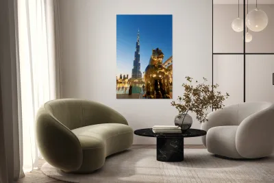 Burj Khalifa and golden horse statue at dusk in Dubai Reproduction