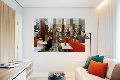 Dining in a modern restaurant with reflective walls in Dubai Reproduction