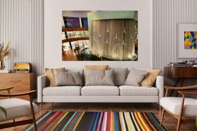 Indoor waterfall with diver sculptures in a mall in Dubai UAE Reproduction