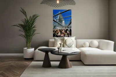 Dining area in Paris with modern building under clear sky Reproduction