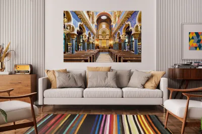 Grand ornate synagogue interior featuring golden ark and pews. Reproduction