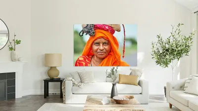 Portrait of an old woman in Rajasthan India wearing bright clot Reproduction