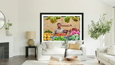 Fruits and vegetables stall in Jaisalmer with vendor at work Reproduction