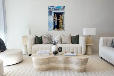 Women stand at their house door in Bundi Rajasthan Reproduction