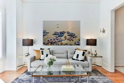 Sunrise at Ganges River in Varanasi with boats and activities Reproduction