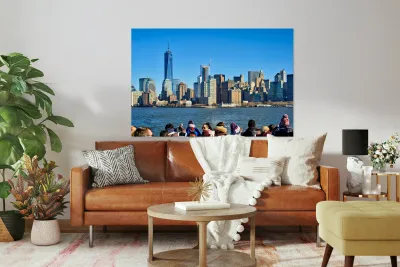 Tourists view Manhattan skyline from a boat on the water in New  Reproduction