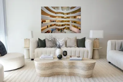 People walk and observe art in the Solomon R Reproduction