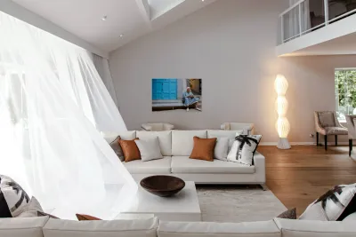 Portrait of a beggar sitting by a blue door in Fez Morocco Reproduction