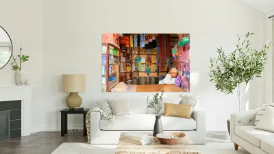 Grocer sleeping in shop in Marrakesh during afternoon hours Reproduction