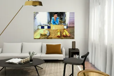 Butcher in Meknes souk interacts with customers during market ho Reproduction