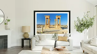 Exploring the Tetrapylon at Palmyra in Syria during the day Reproduction