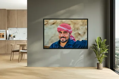 Young man in Syria smiles during a sunny day outdoors Reproduction