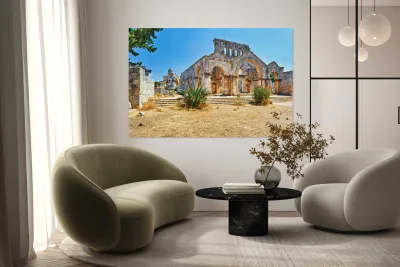 Visitors explore the ruins of Church of Saint Simeon Stylites in Reproduction