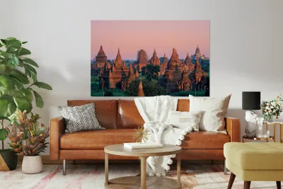 Temples in Bagan at dusk with a clear sky over Myanmar Reproduction