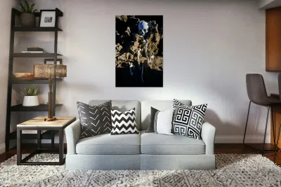 Human skeleton partially buried in rocky terrain. Reproduction