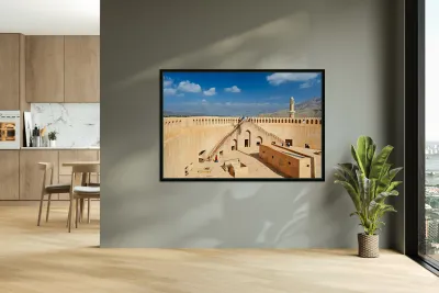 Visit to Nizwa Fort in Oman with visitors and open sky Reproduction