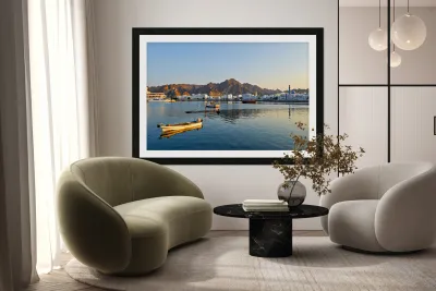 Waterfront view in Muscat Oman at sunset near boats Reproduction