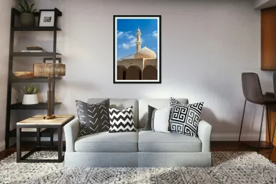 Nizwa Fort shows mosque and tower with blue sky and clouds Reproduction