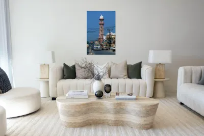 Busy street scene with tall tower in Peshawar Pakistan Reproduction