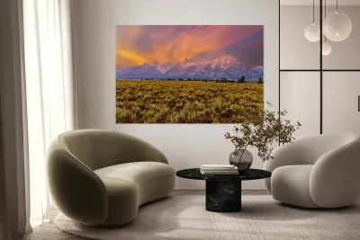 Hikers explore view of Grand Teton mountains at sunset Reproduction