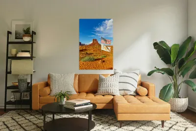 Monument Valley displays flags under blue sky in USA Reproduction