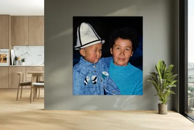 Uzbekistan mother and child in traditional attire during daytime Reproduction