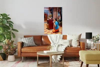 Woman prays at a temple in Ho Chi Minh City Vietnam Reproduction