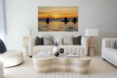 Silhouetted heads against infinity edge pool Reproduction