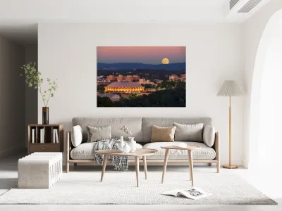 Moon rising above the Coliseum at WVU Reproduction