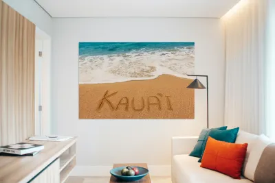 Kauai written in sandy beach Reproduction